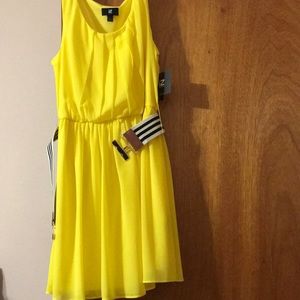 Bright yellow dress size large. Never worn.